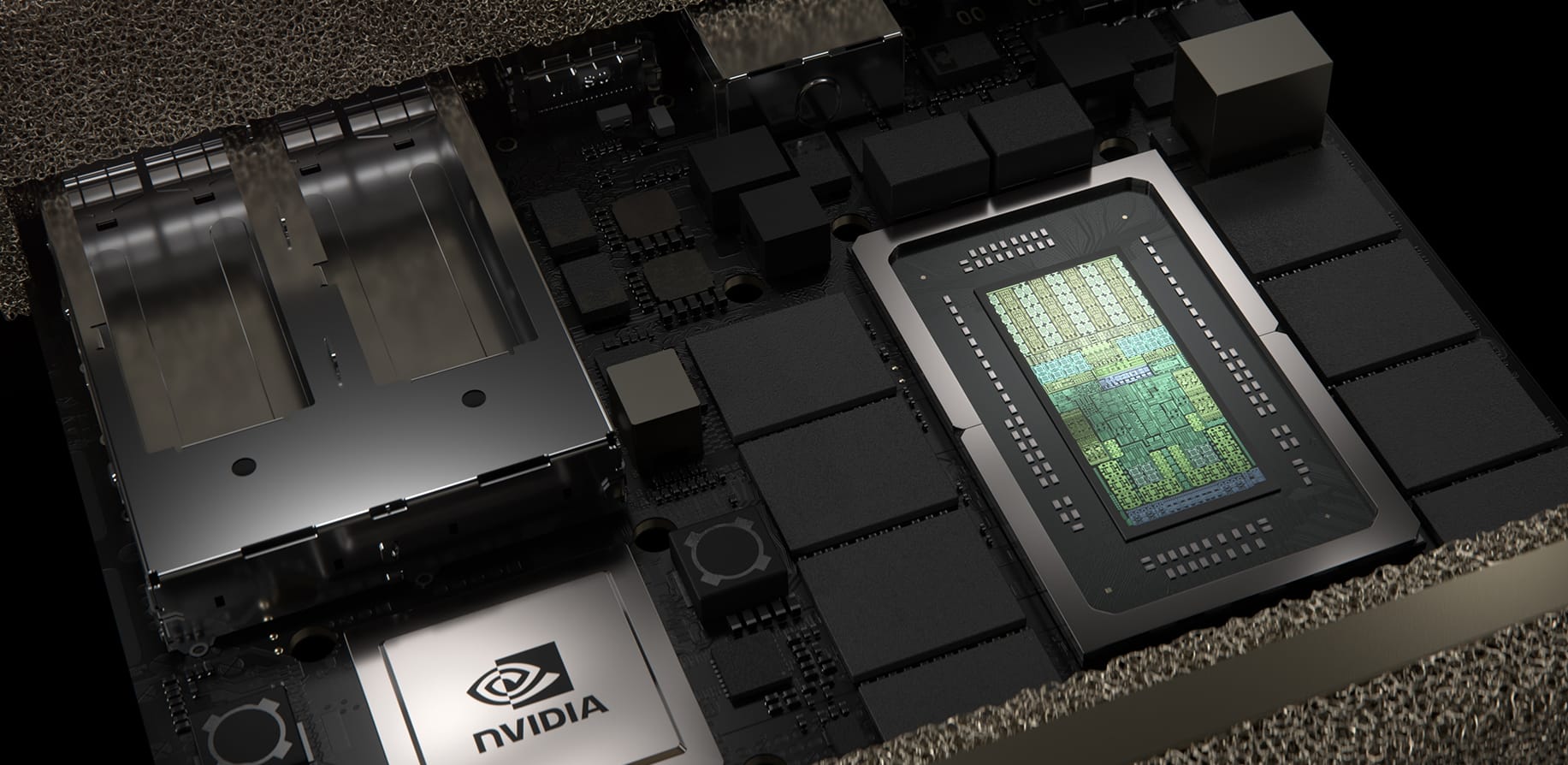 Close-up view of an NVIDIA DGX Spark GB10 system’s internal components, showcasing the GPU and intricate circuit board architecture with metallic and black elements.